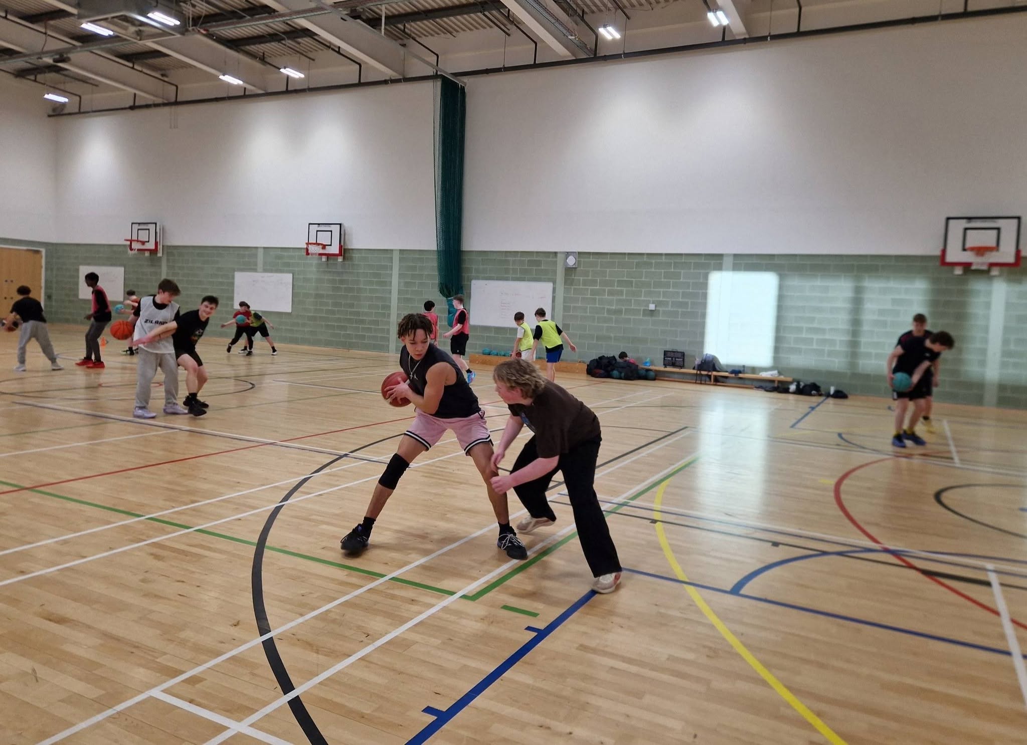 North East Fife Basketball players competing in a busy game-based training session
