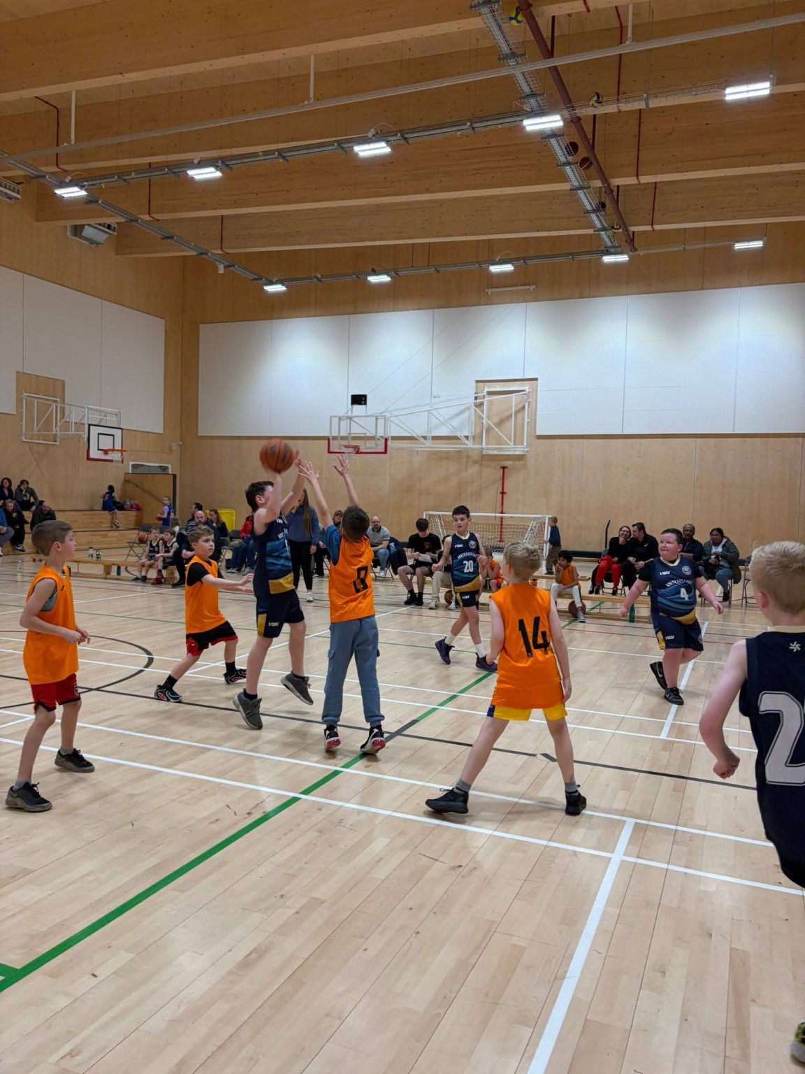 North East Fife Basketball players competing during a junior match