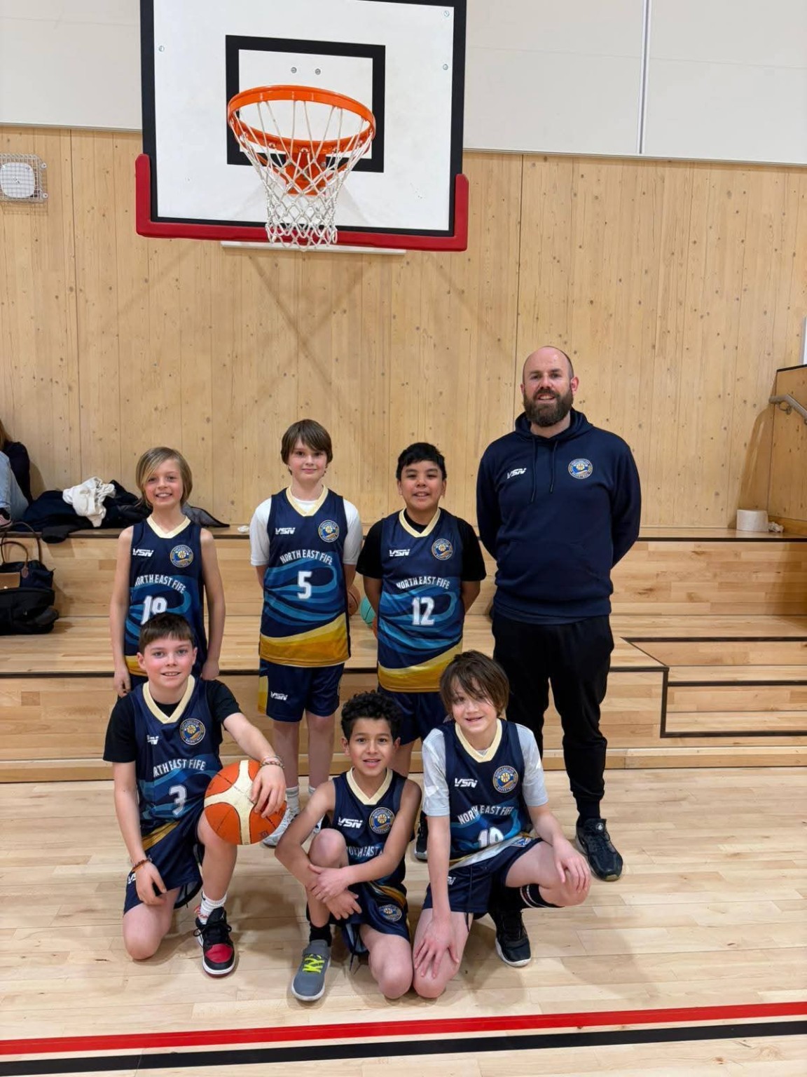 Coach Shayne with a North East Fife Basketball junior team